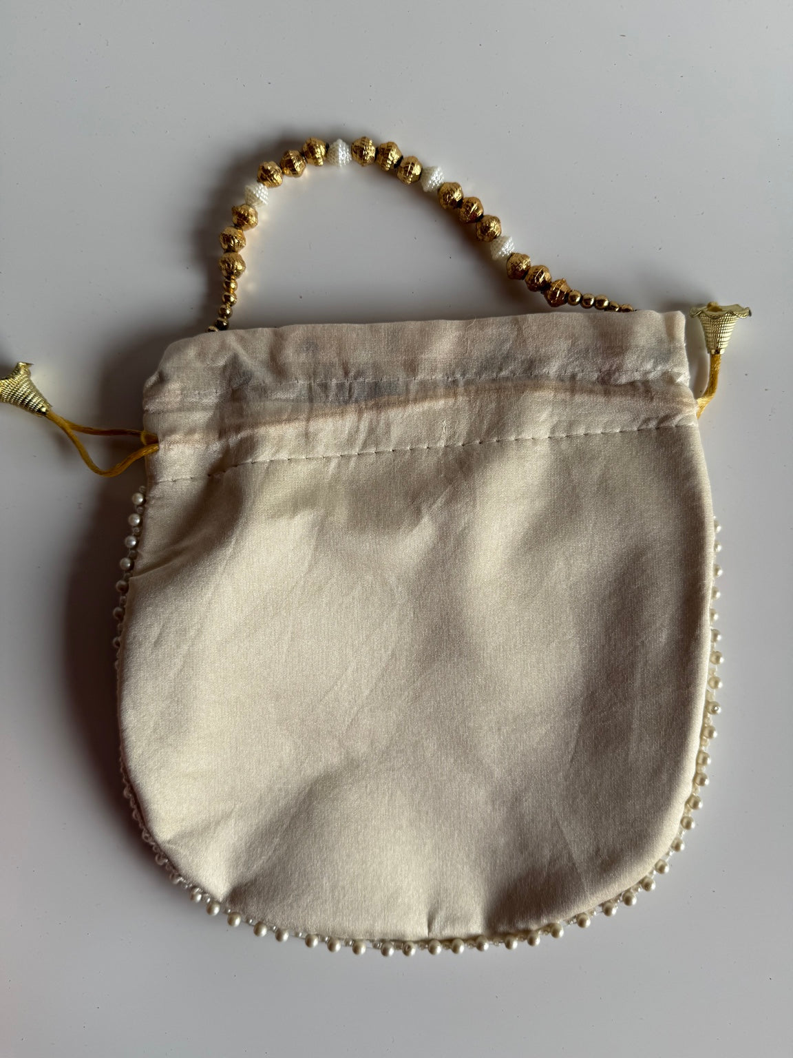 Handcrafted Ivory Floral Embroidered Potli Purse with Pearl Handle | Premium Wedding & Festive Drawstring Handbag | Rajasthan Artisan Collection