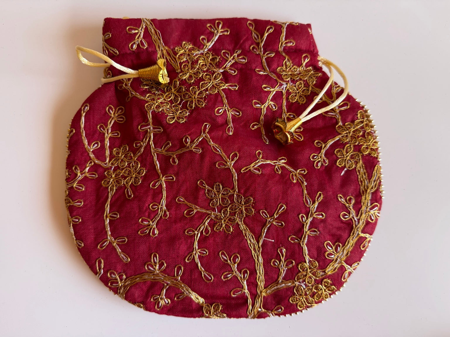 Handcrafted Wine Silk Potli Bag with Gold Zari Floral Embroidery | Rajasthan Artisan Collection