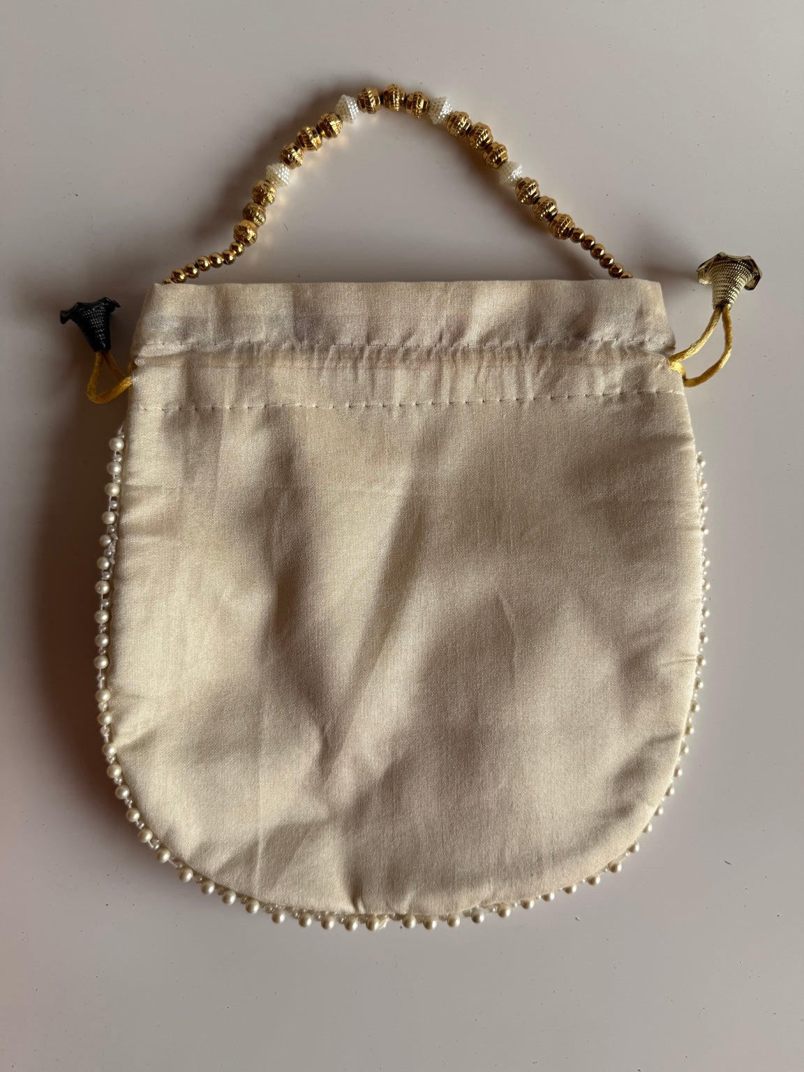 Handcrafted Ivory Floral Embroidered Potli Purse with Pearl Handle | Luxury Wedding & Festive Handbag | Rajasthan Artisan Collection