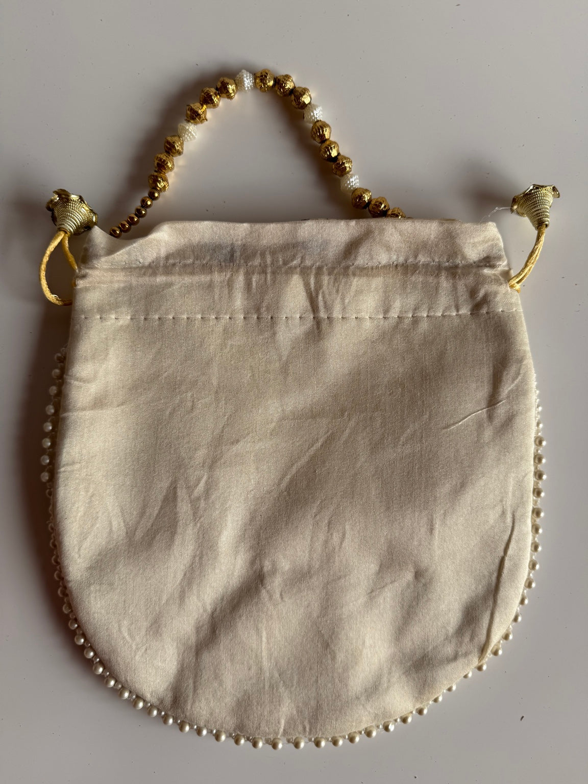Handcrafted Ivory Vine Embroidered Potli Purse with Pearl Handle | Wedding & Festive Drawstring Handbag | Rajasthan Artisan Collection