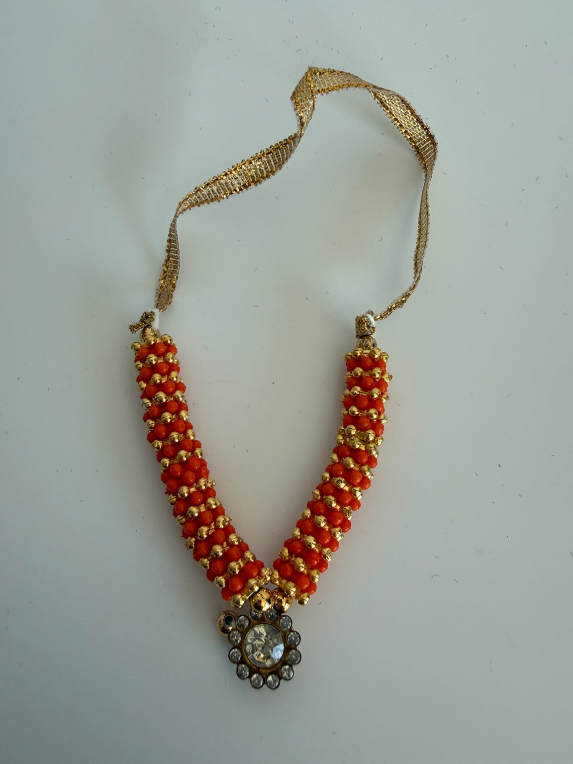 Traditional Orange Ganesh Idol Garland (Mala) – Handcrafted Murti Necklace with Crystal Pendant