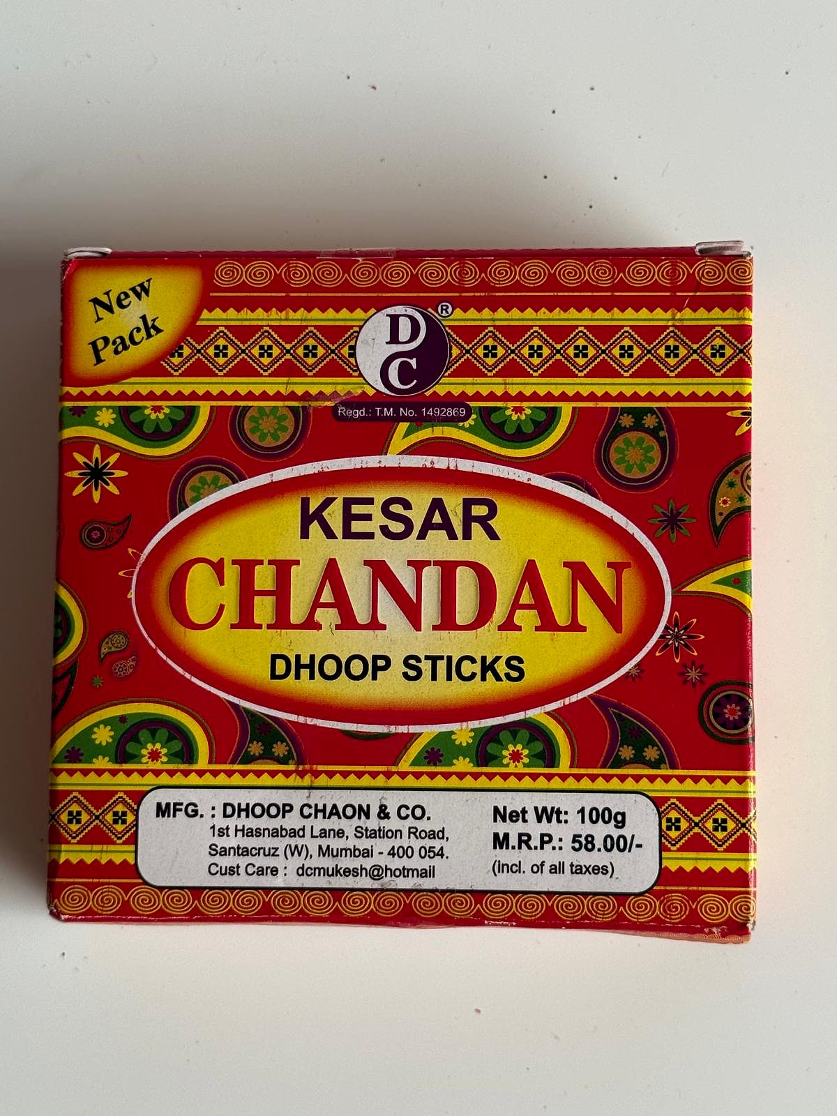 Close-up of packaging details for Kesar Chandan Dhoop Sticks