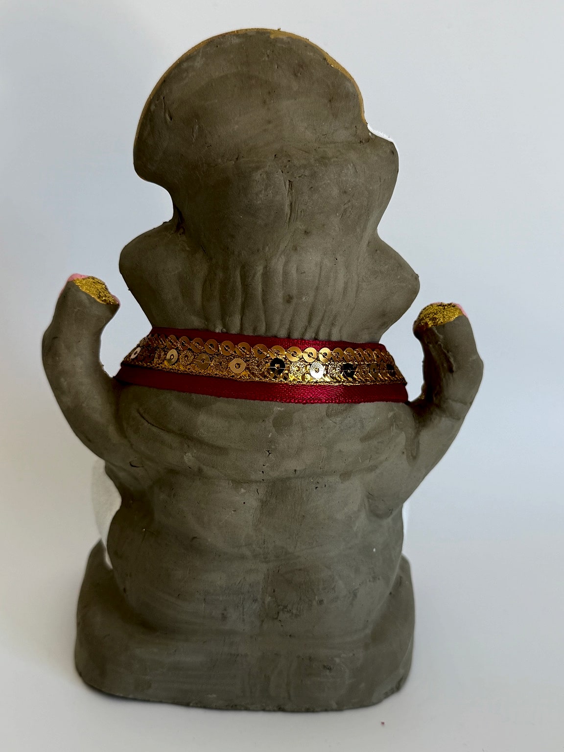 Back view of Ganesh idol displaying elegant craftsmanship