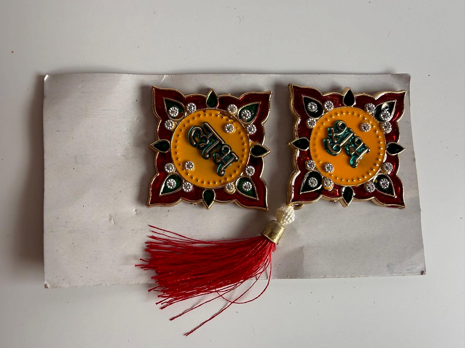 Decorative Shubh Labh hangings with red tassel