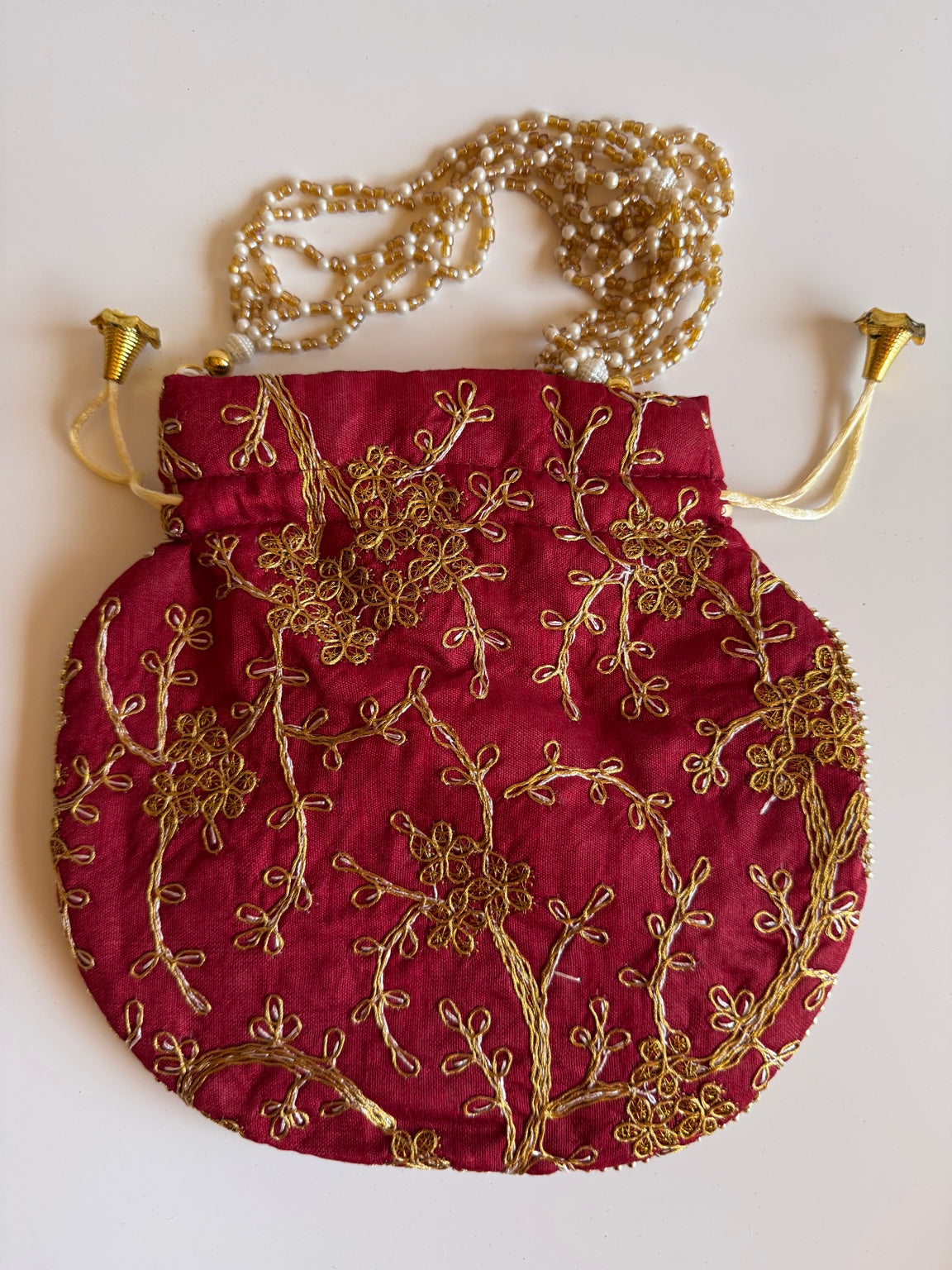 Handcrafted Wine Silk Potli Bag with Gold Zari Floral Embroidery | Rajasthan Artisan Collection
