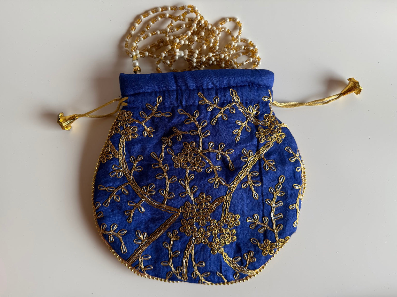 Handcrafted Royal Blue Silk Potli Bag with Gold Zari Floral Embroidery | Rajasthan Artisan Collection