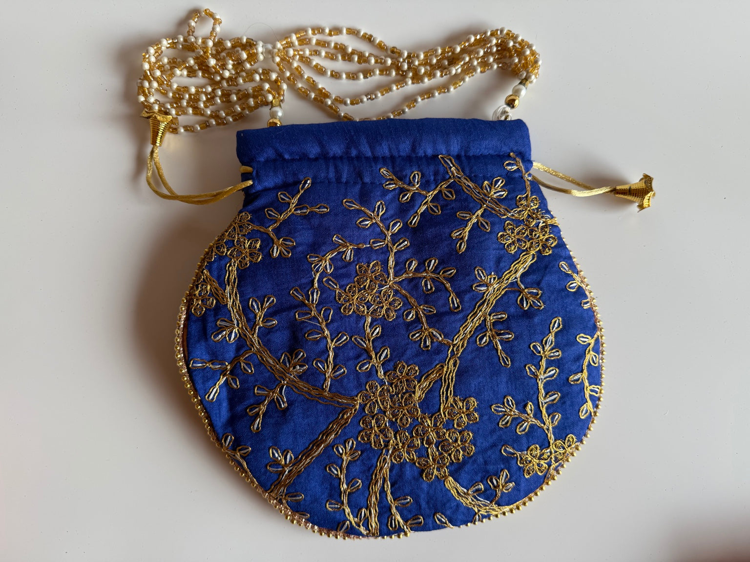 Handcrafted Royal Blue Silk Potli Bag with Gold Zari Floral Embroidery | Rajasthan Artisan Collection