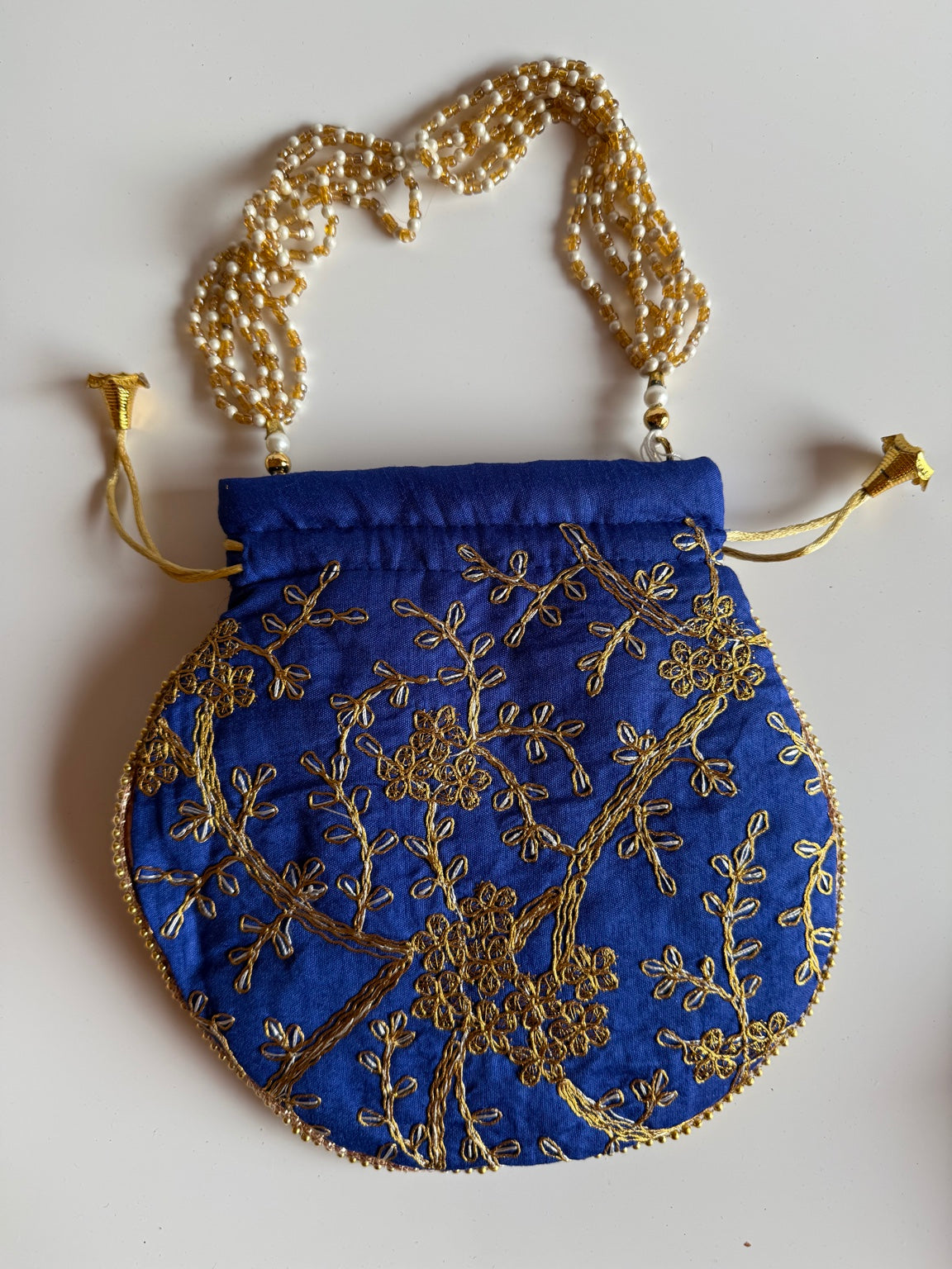 Handcrafted Royal Blue Silk Potli Bag with Gold Zari Floral Embroidery | Rajasthan Artisan Collection