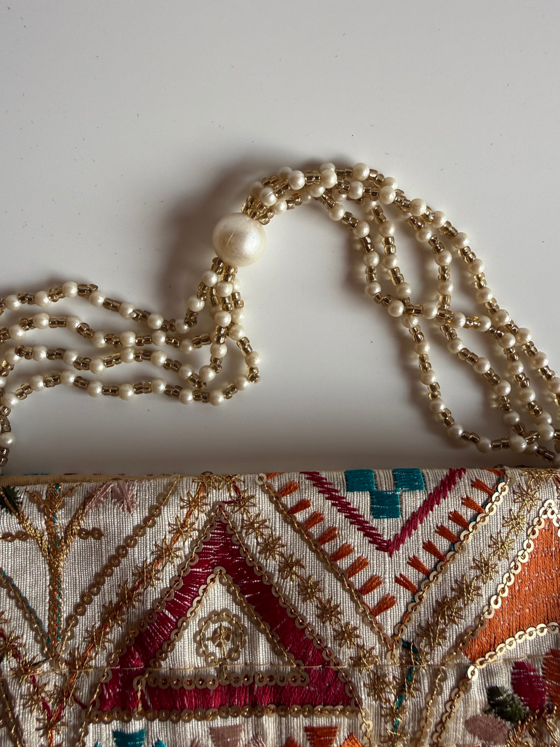Handcrafted Geometric Embroidered Clutch Purse with Pearl Handle | Ethnic Wedding Handbag | Rajasthan Artisan Collection