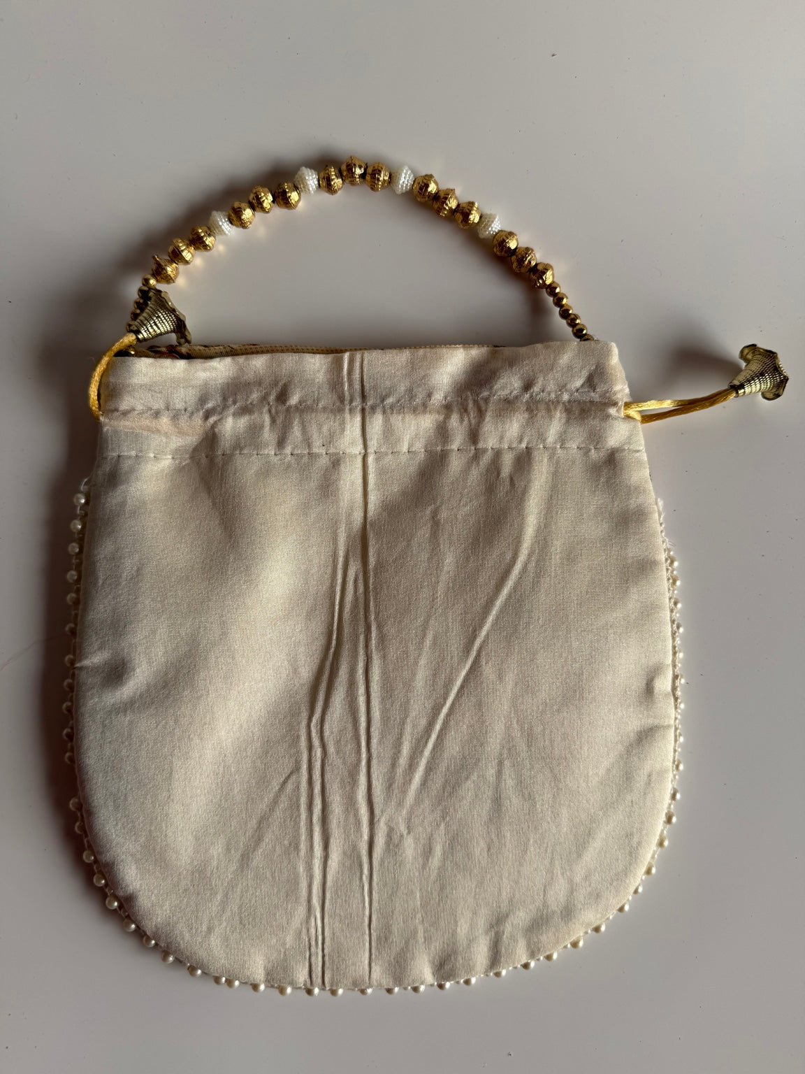 Handcrafted Floral Vine Embroidered Potli Purse with Pearl Handle | Ivory Wedding Clutch | Rajasthan Artisan Collection