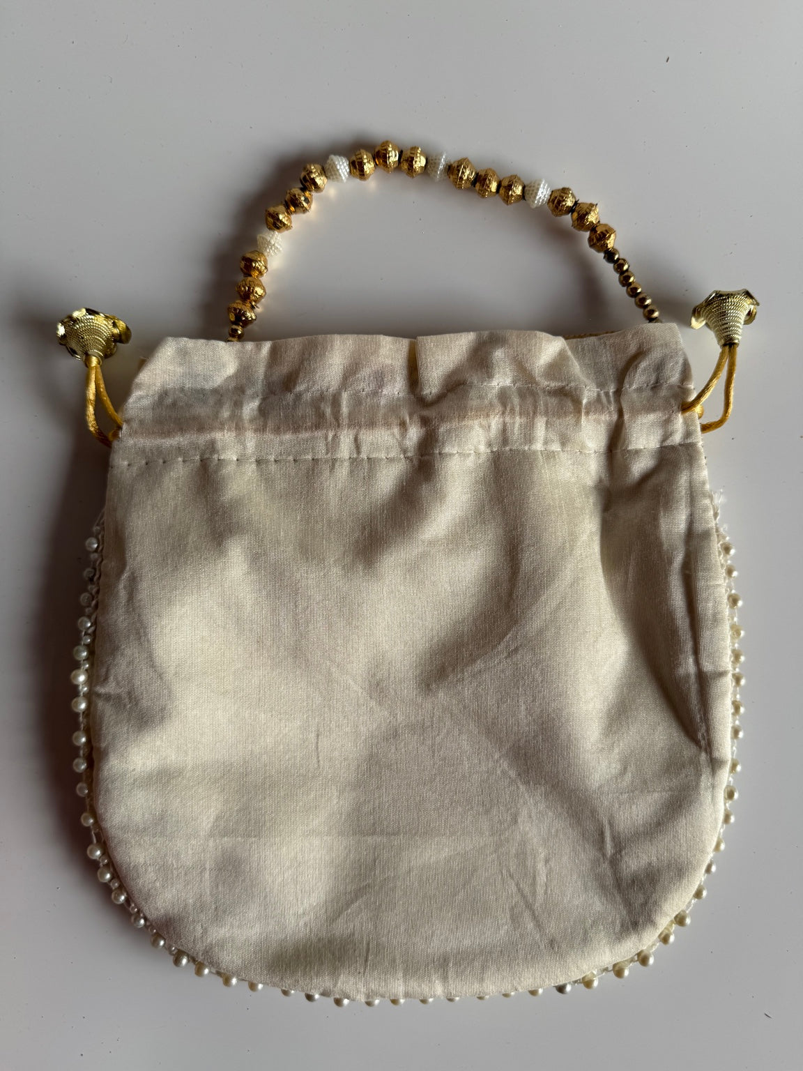Handcrafted Ivory Floral Embroidered Potli Purse with Pearl Handle | Wedding & Festive Drawstring Handbag | Rajasthan Artisan Collection