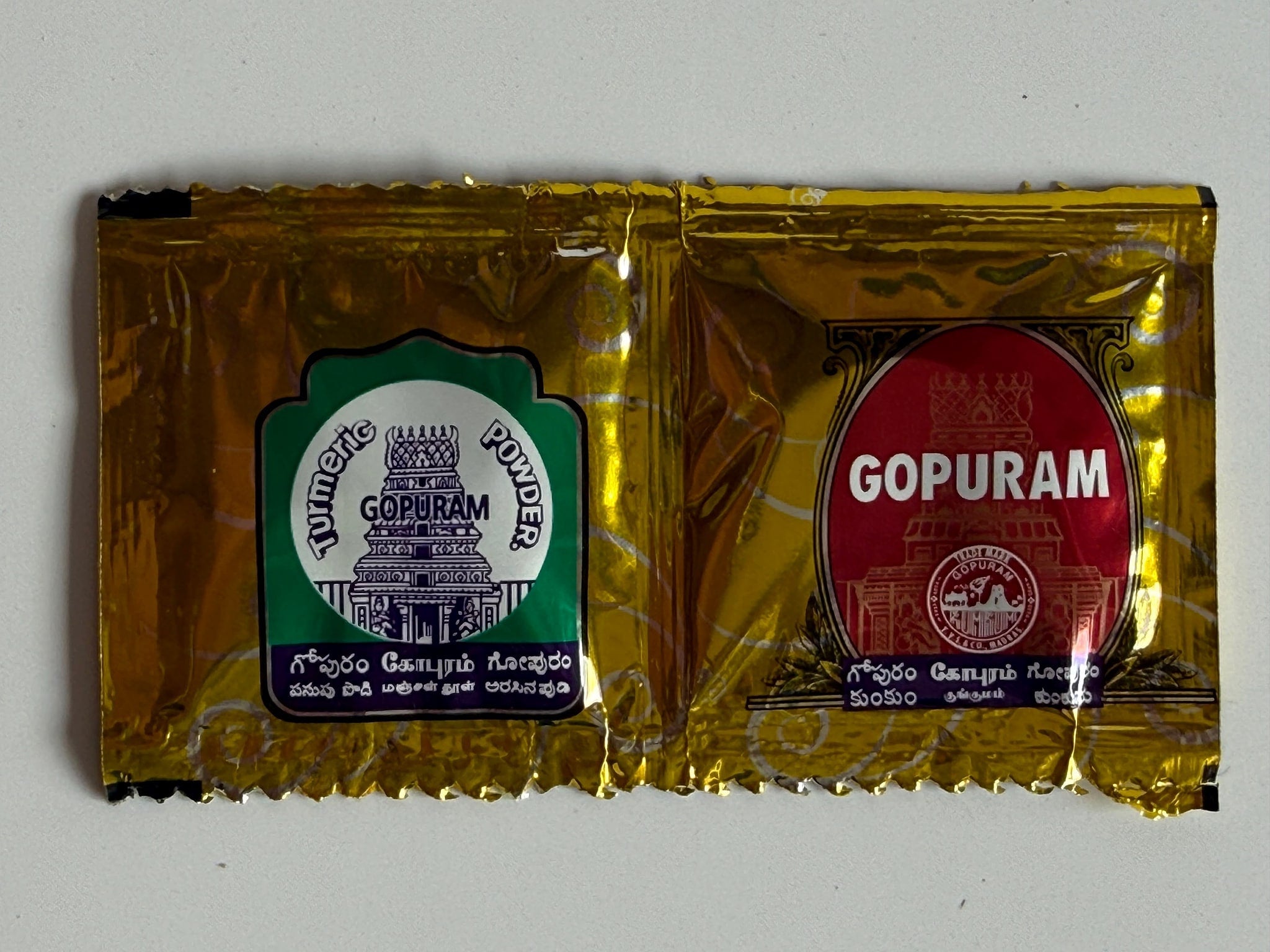 Golden and red packaging of Gopuram Turmeric and Kumkum Combo