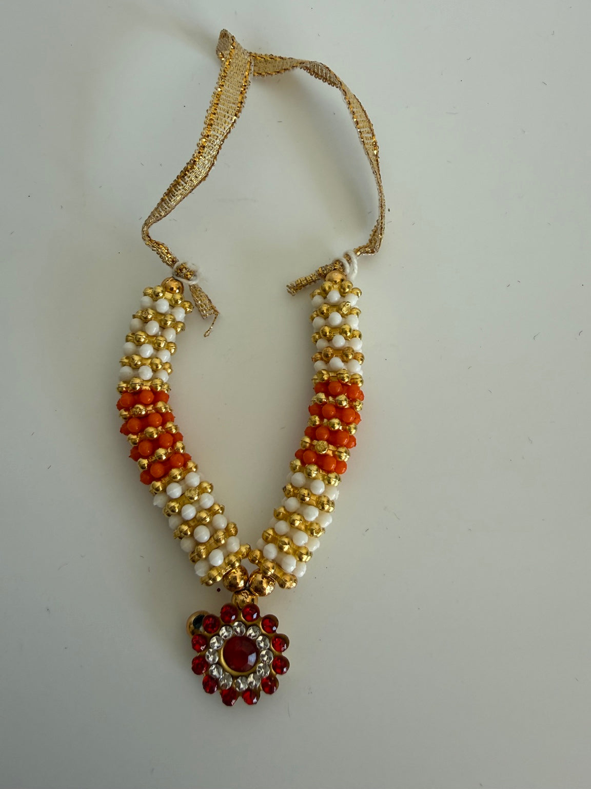 Orange & White Ganesh Idol Garland (Mala) – Handcrafted Murti Necklace with Ruby Crystal Pendant