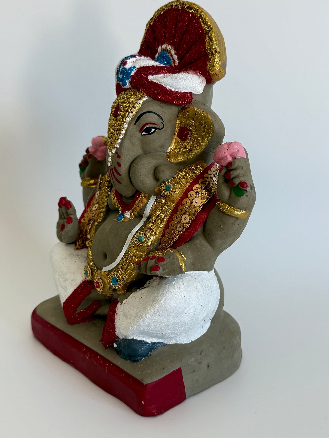Side view of Ganesh idol showing intricate detailing