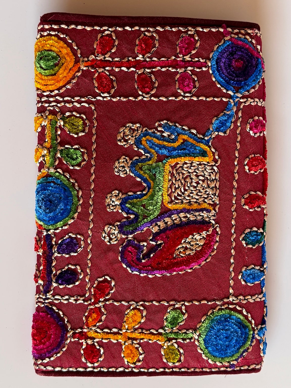 Back view showcasing colorful embroidery