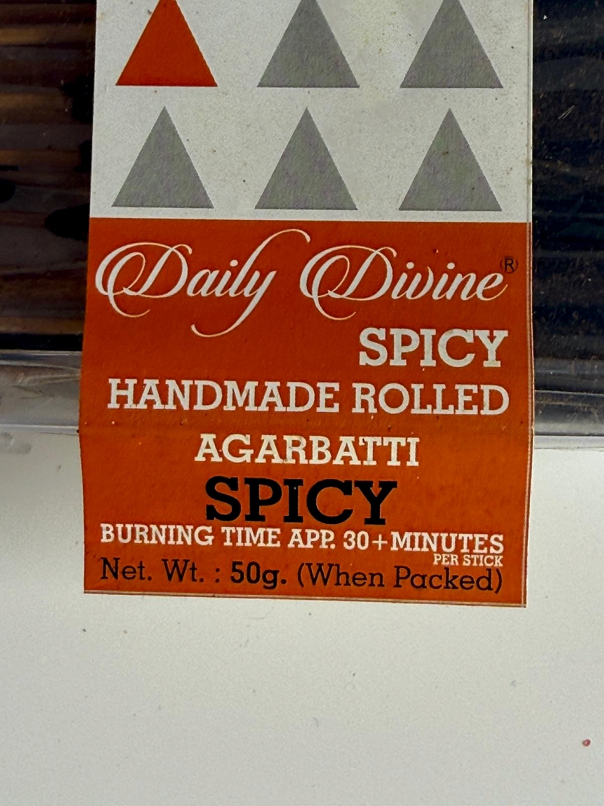 Close-up of the bold vibrant label on the incense packaging