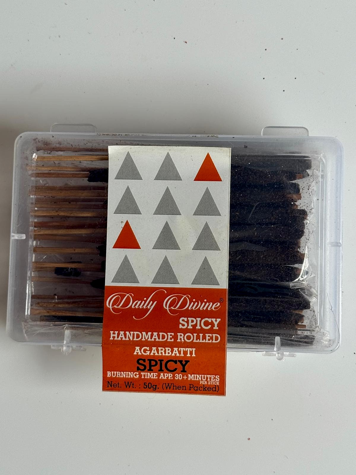 Focused view of the packed agarbatti sticks within the protective casing