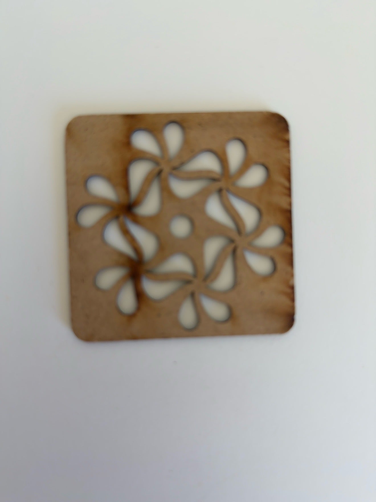 Pinwheel Floral Rangoli Stencil – Whirling Blossom Design